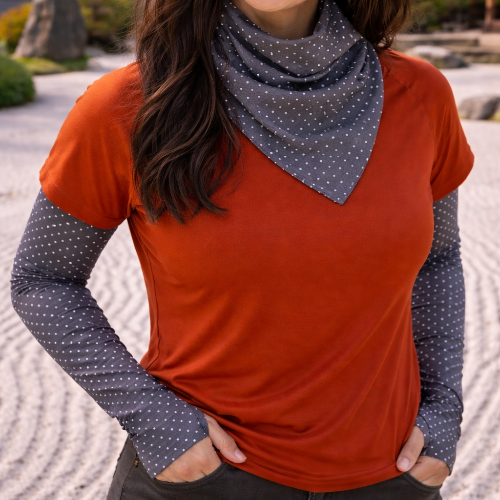 woman wearing eclipse bandana and sun sleeves in starry night in japanese garden
