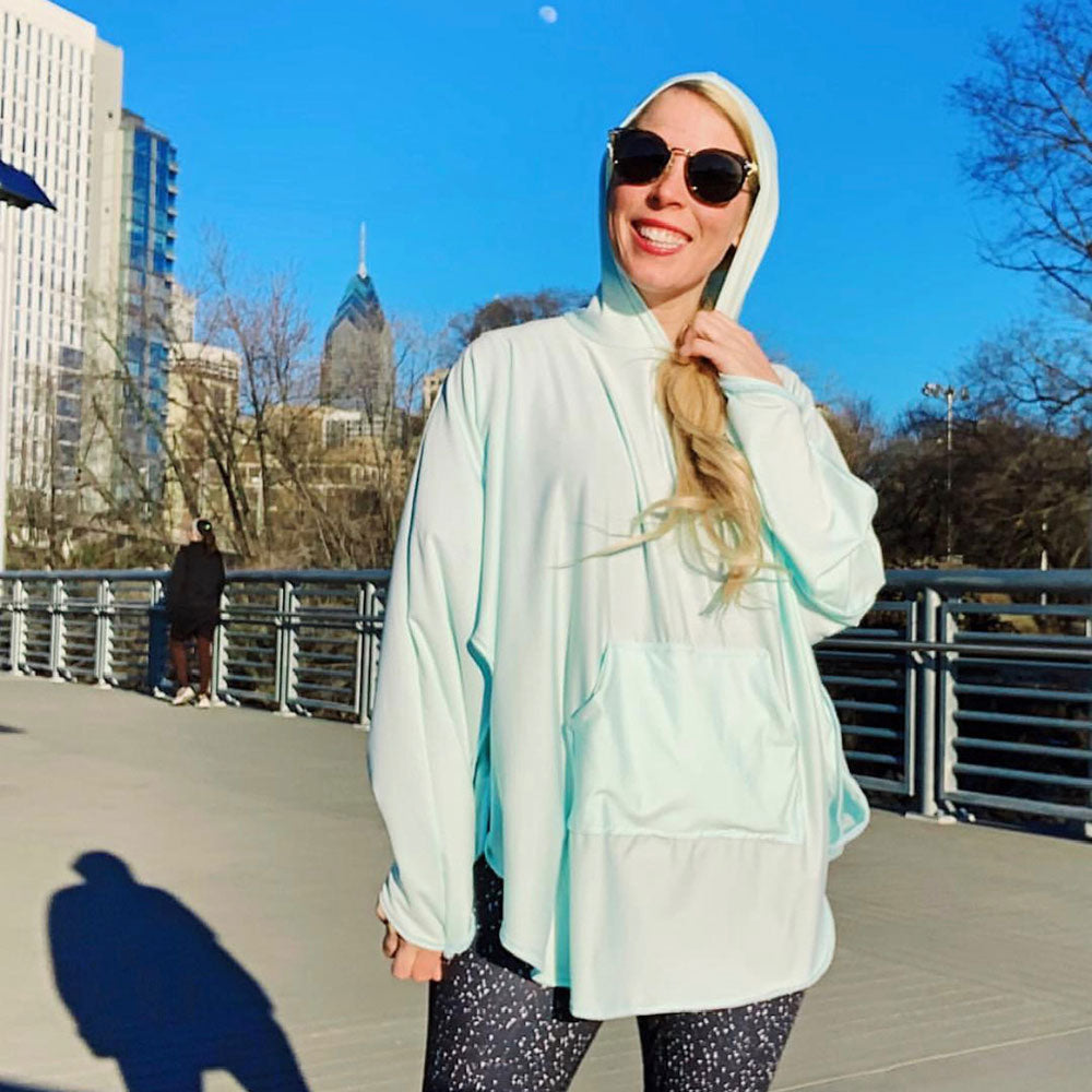 @drkater wearing the Equinox hoodie cover up in aqua